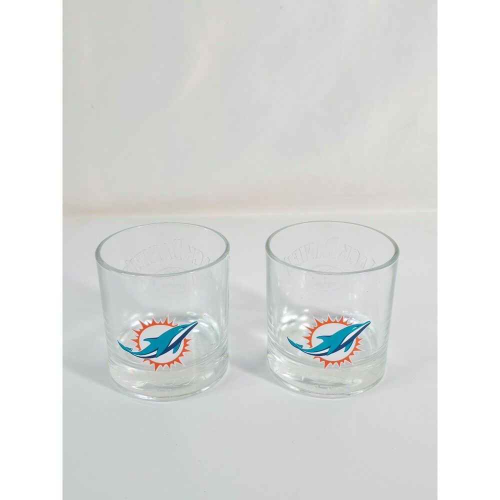 Jack Daniel's promotional NFL rocks glasses featuring the Miami Dolphins logo